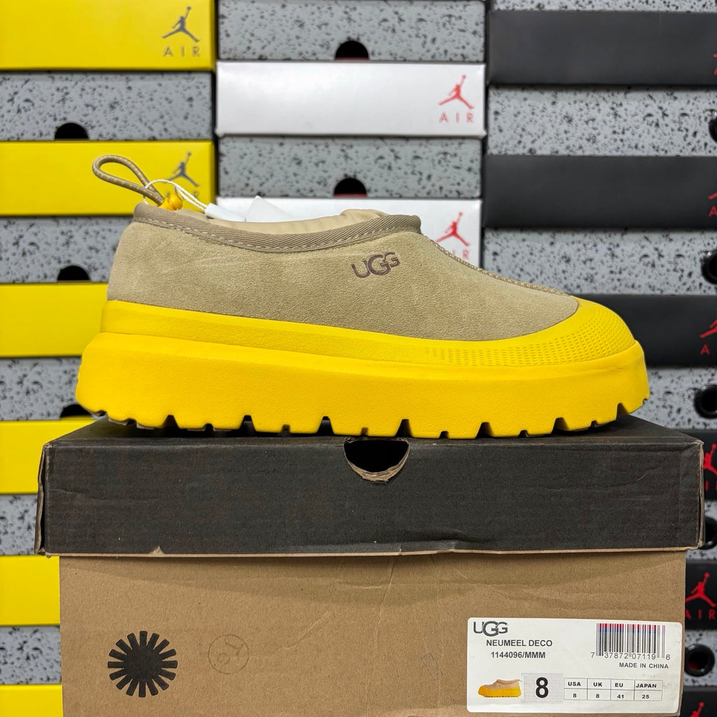 UGG Neumeel Deco Slip-On – Suede Moccasin Sneaker with Yellow Lug Sole & Carabiner Collar in Sand